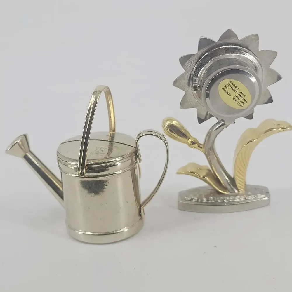 2 SMALL QUARTZ CLOCKS FLOWER & WATER CAN NEED BATTERIES Goldtone Metal Vintage